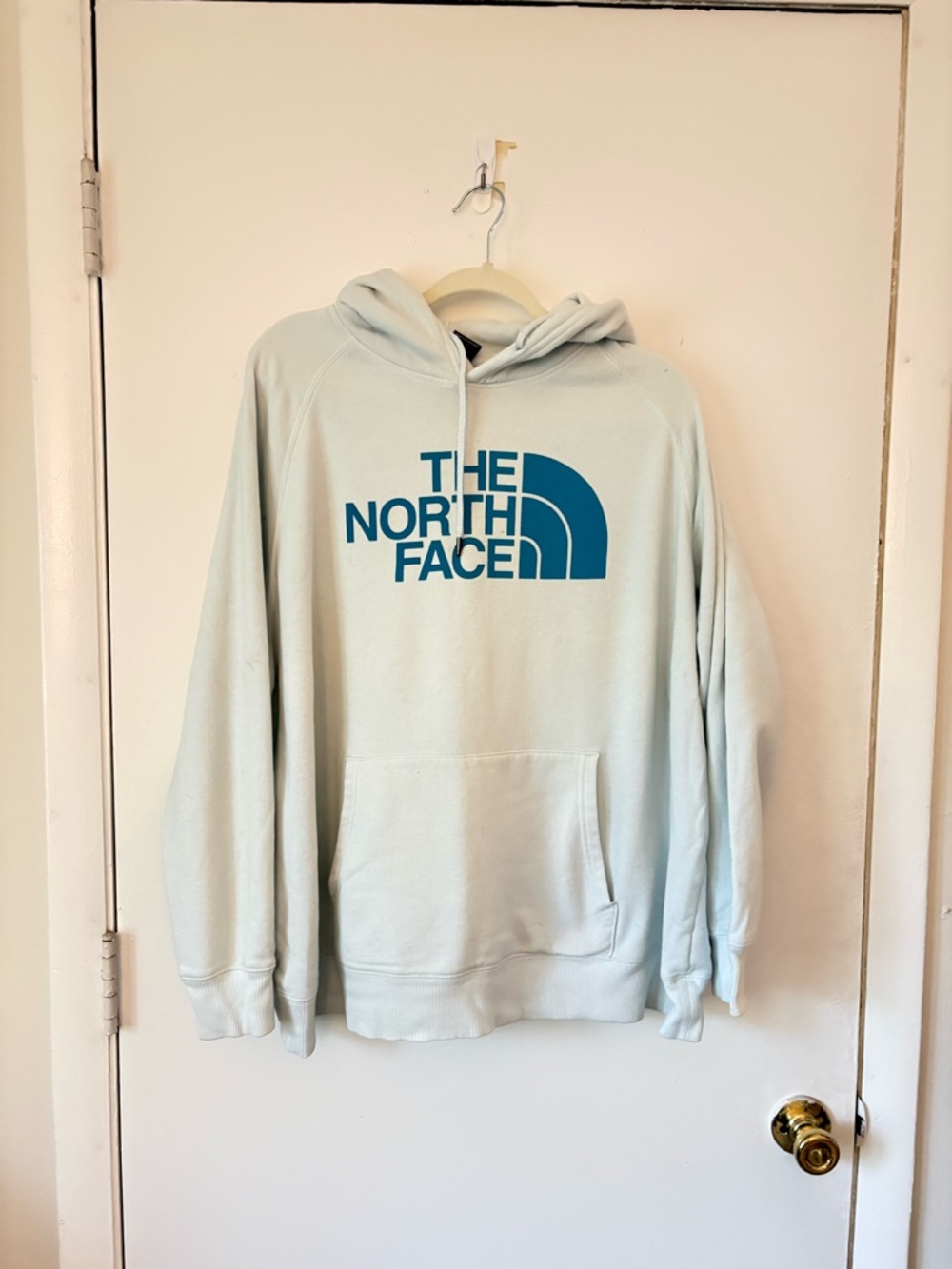 The North Face Women's Pale Blue Pullover Hoodie with Teal Logo